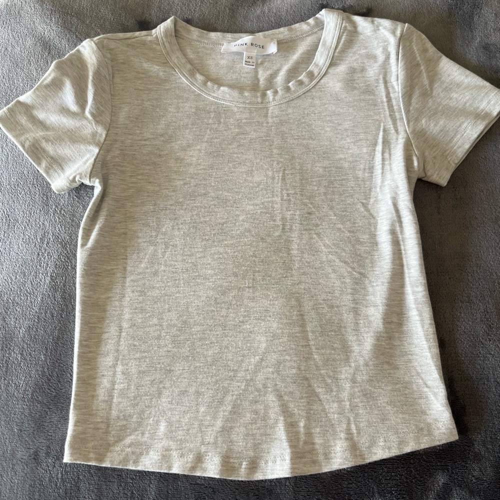 Light grey tee shirt, thick material, extra small, never worn